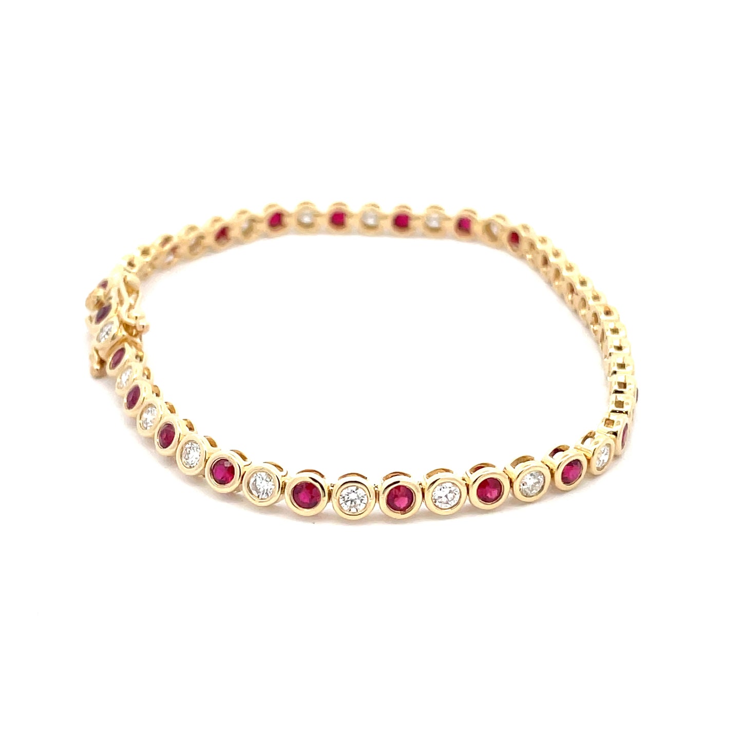 Ruby and Round Brilliant cut diamond, rub-over style tennis bracelet Gardiner Brothers