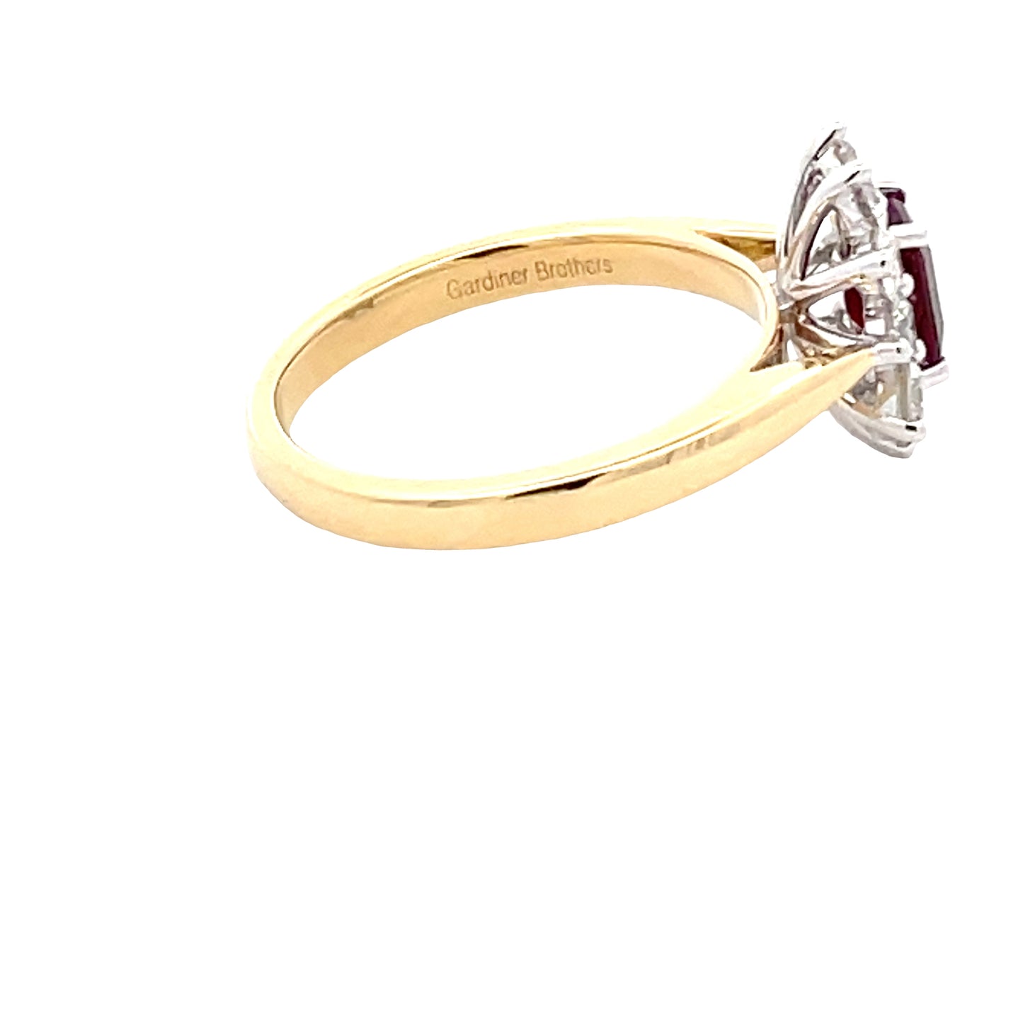 Octagonal Shaped Ruby and Round Brilliant Cut Diamond Cluster Ring  gardiner-brothers   