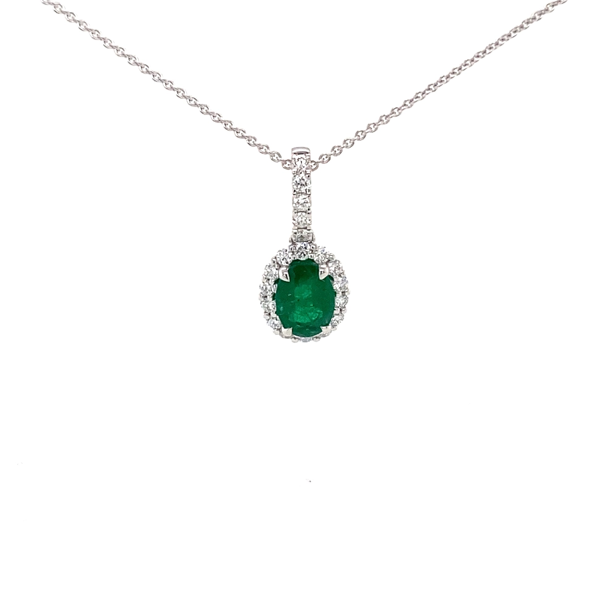 Oval emerald and round brilliant cut diamond halo style pendant  Gardiner Brothers   