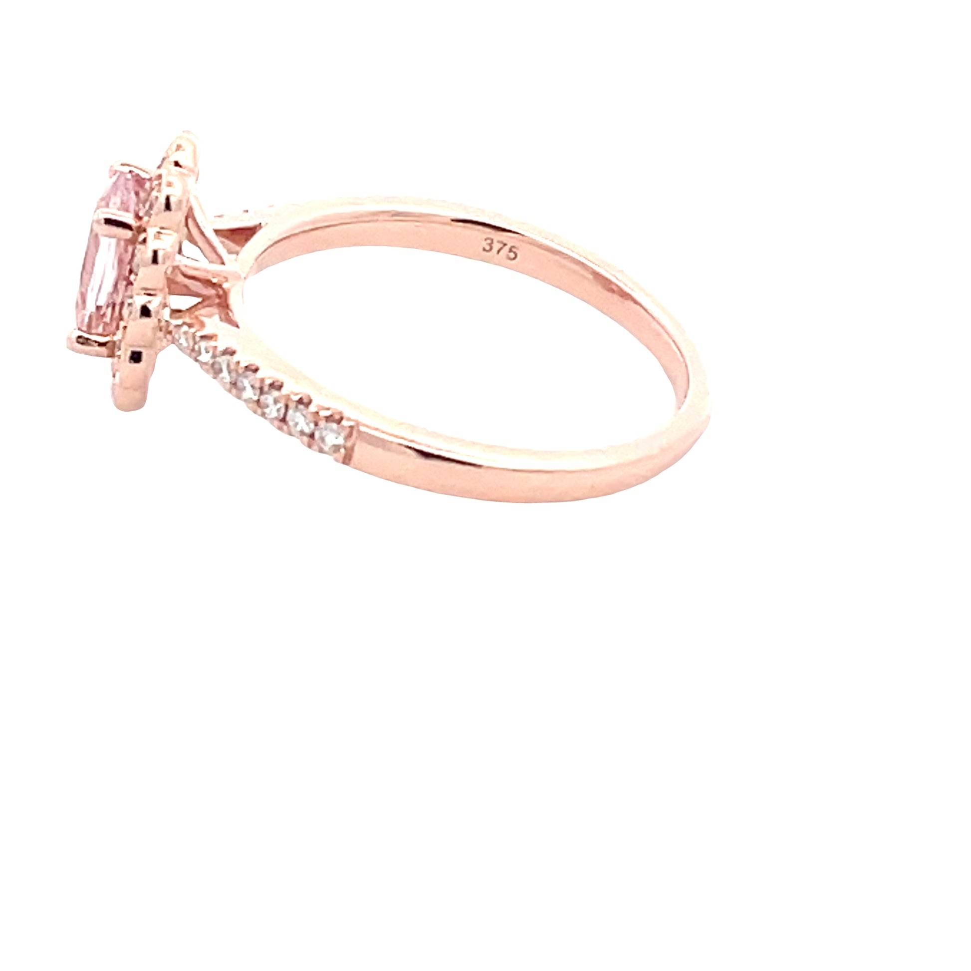 Oval Shaped Morganite and round brilliant cut diamond halo style ring  Gardiner Brothers   