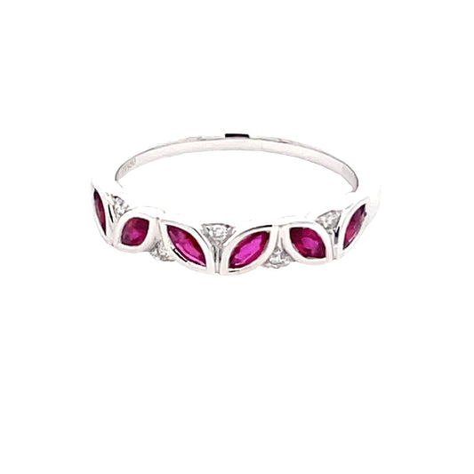 Marquise shaped ruby and round brilliant cut diamond dress ring
