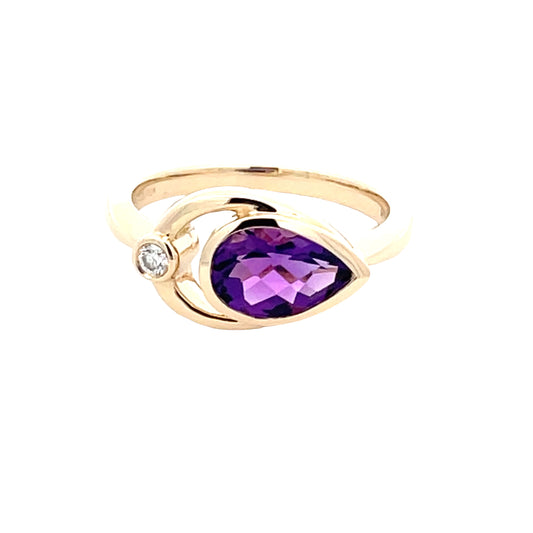 Pear Shaped Amethyst and round brilliant cut diamond dress ring