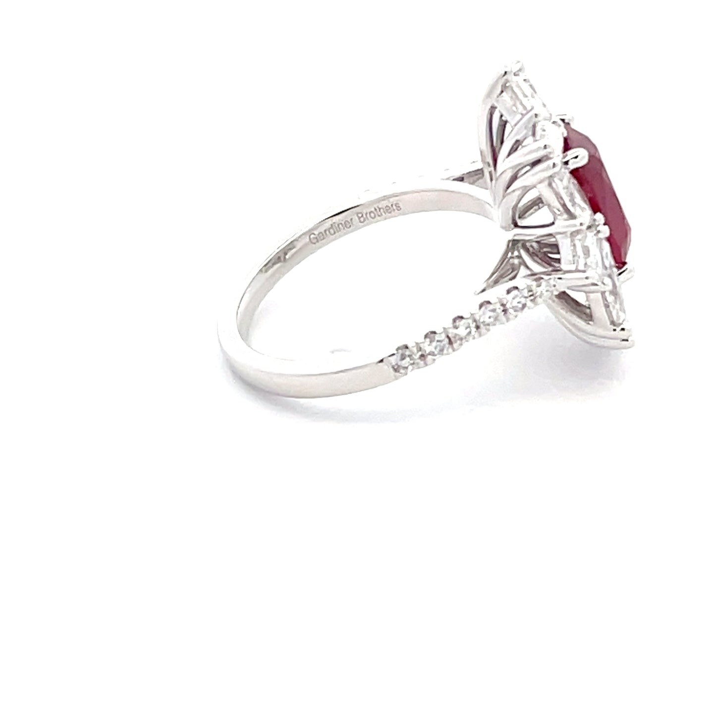 Cushion shaped ruby and diamond cluster style ring Gardiner Brothers