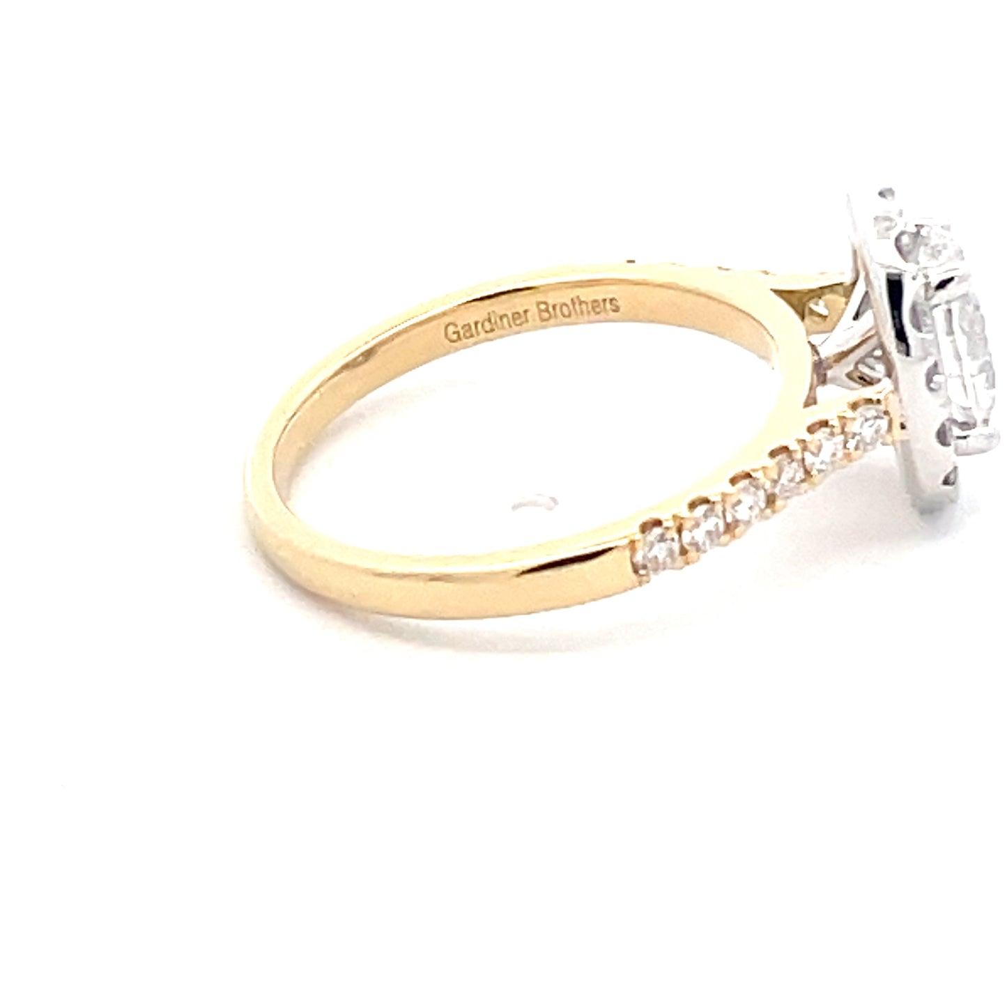 Oval Shaped diamond halo cluster style ring - 1.46cts Gardiner Brothers