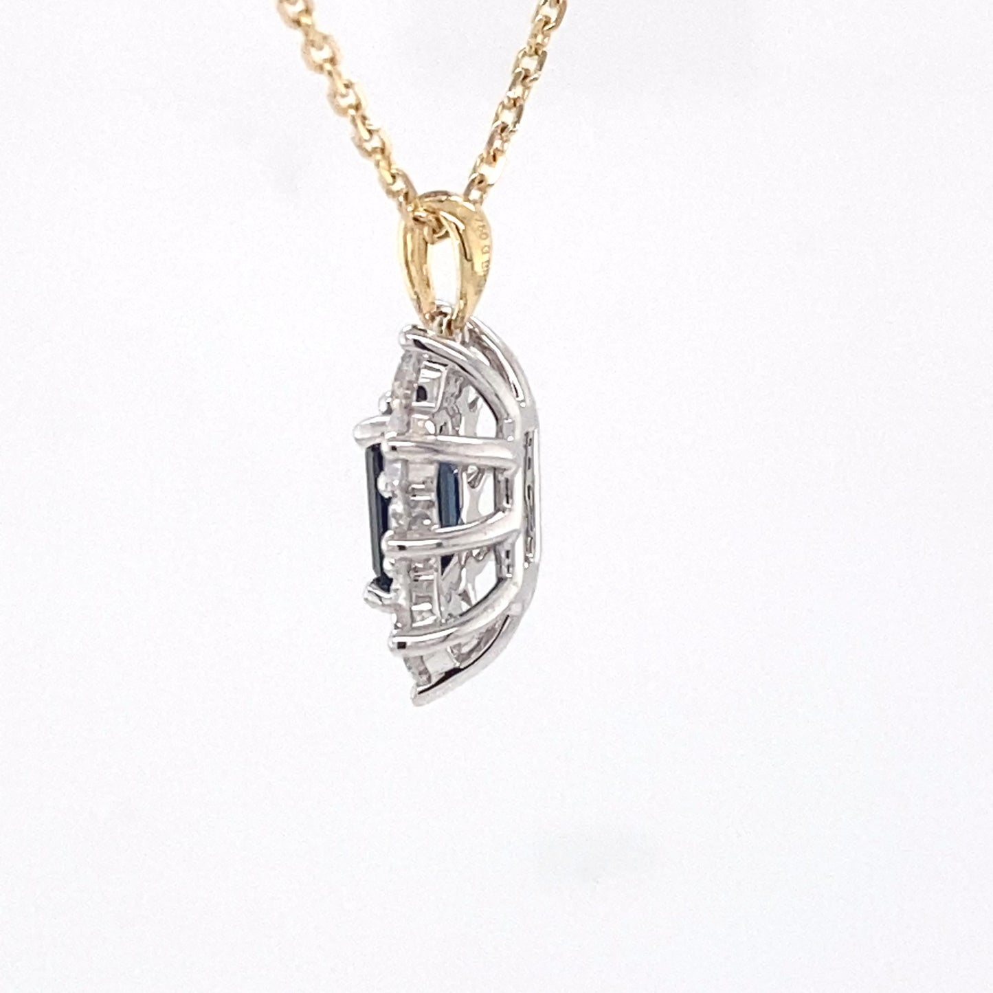 Octagonal sapphire and round brilliant cut diamond cluster pendant Gardiner Brothers