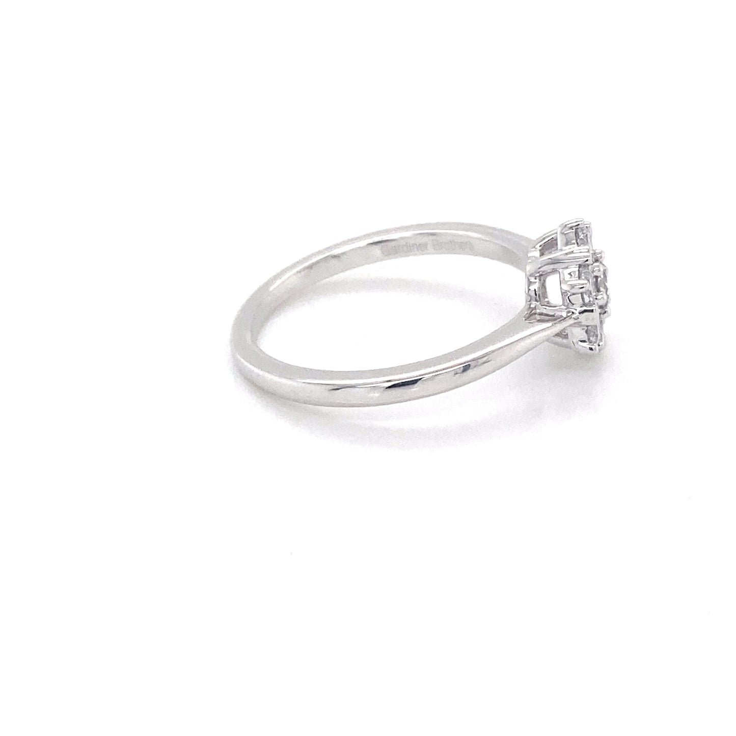 Round Brilliant cut 7 stone diamond cluster style ring - 0.53cts Gardiner Brothers