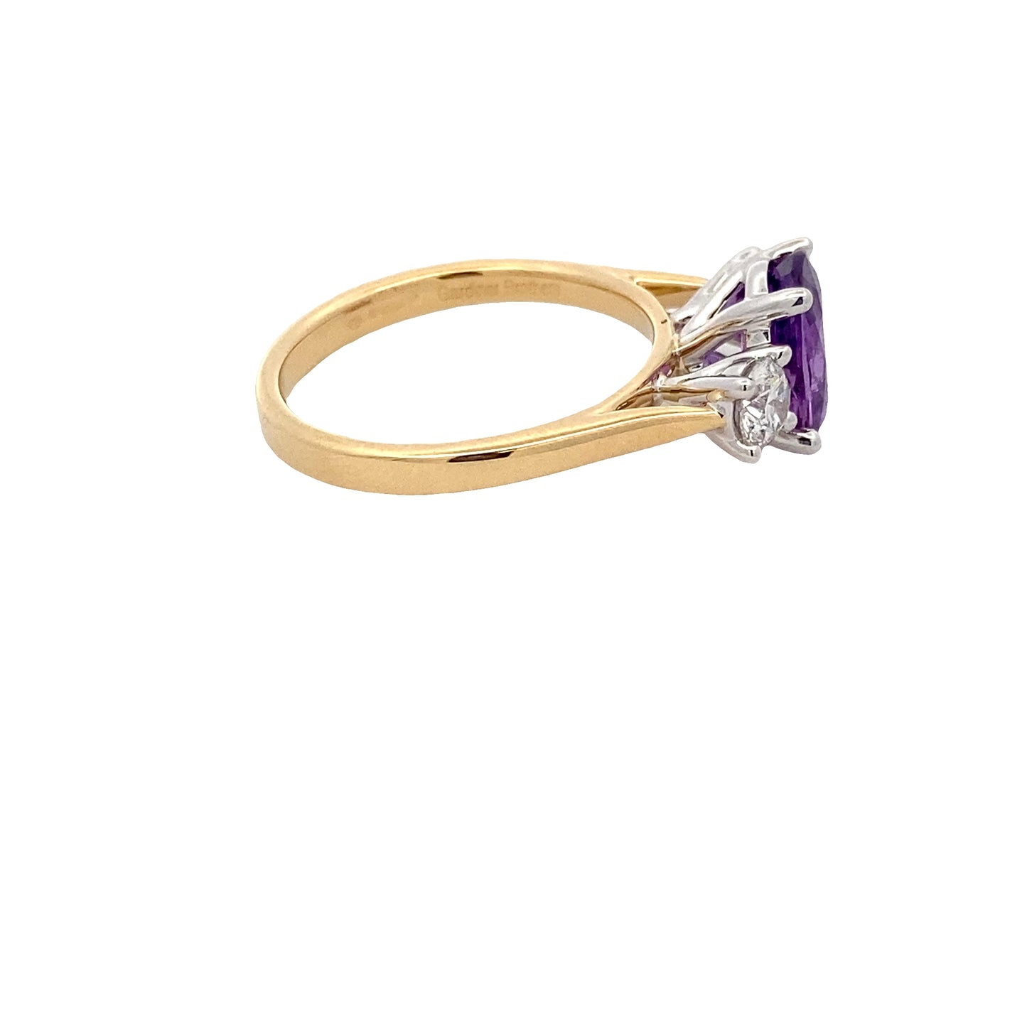 Purple Sapphire and round brilliant cut diamond 3 stone ring Gardiner Brothers