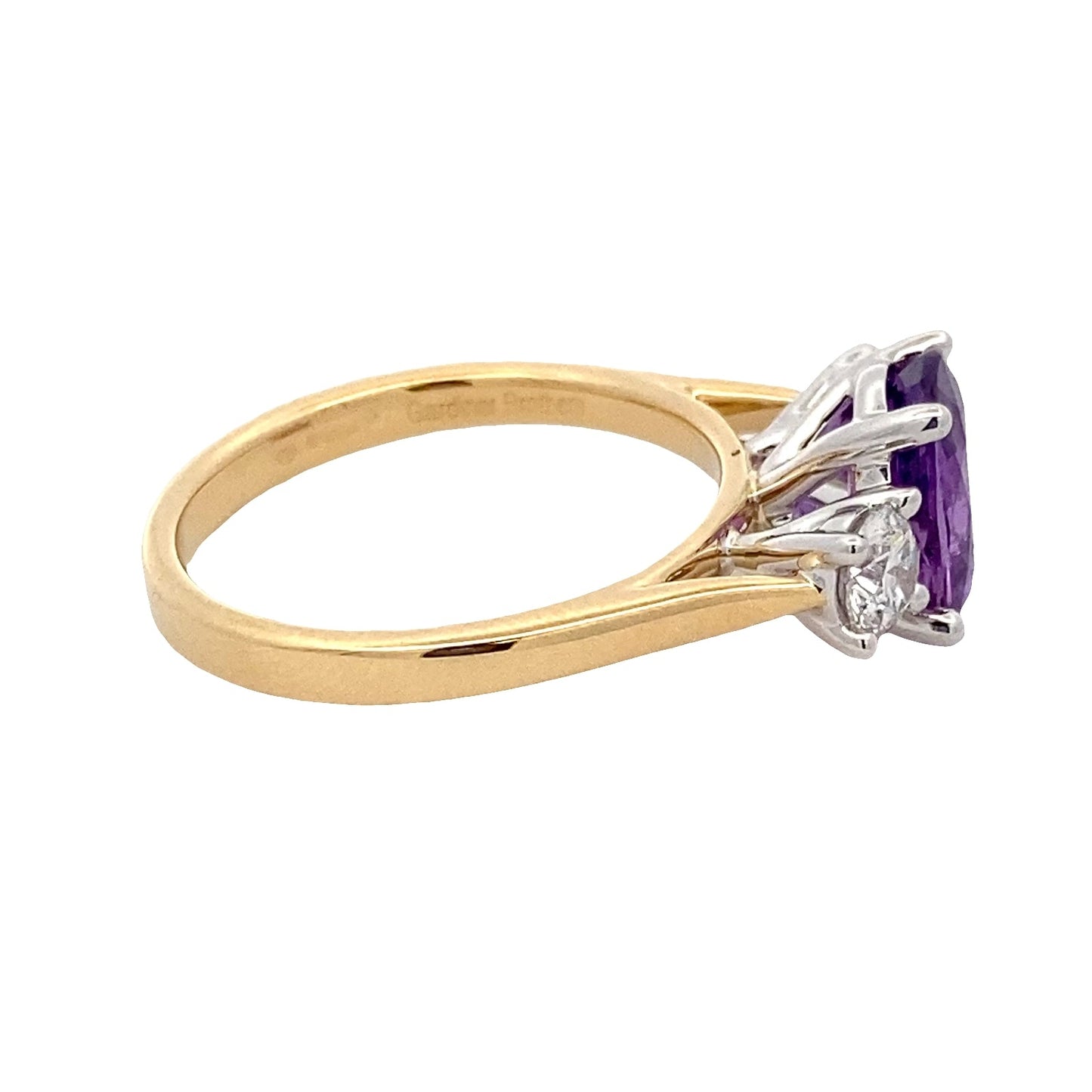Purple Sapphire and round brilliant cut diamond 3 stone ring Gardiner Brothers