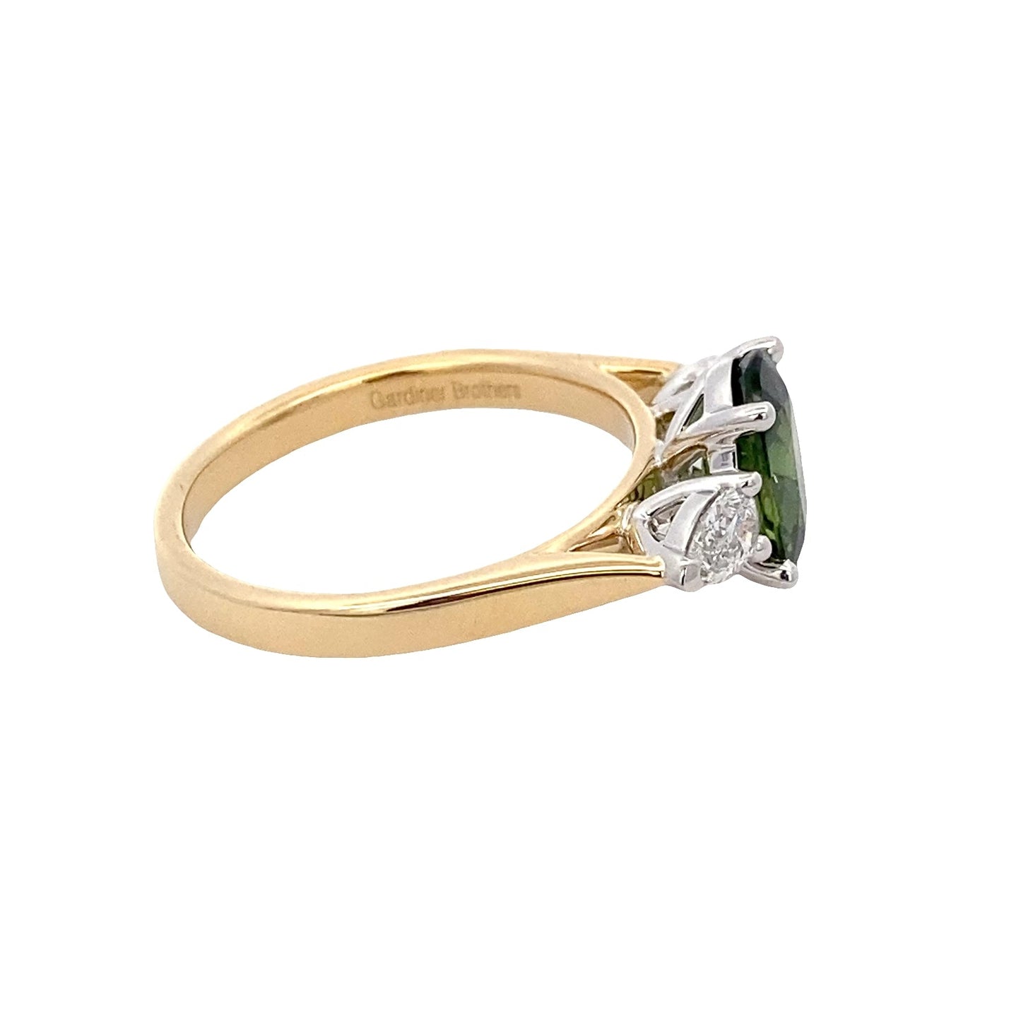 Oval Shaped Green sapphire and pear shaped diamond 3 stone ring Gardiner Brothers