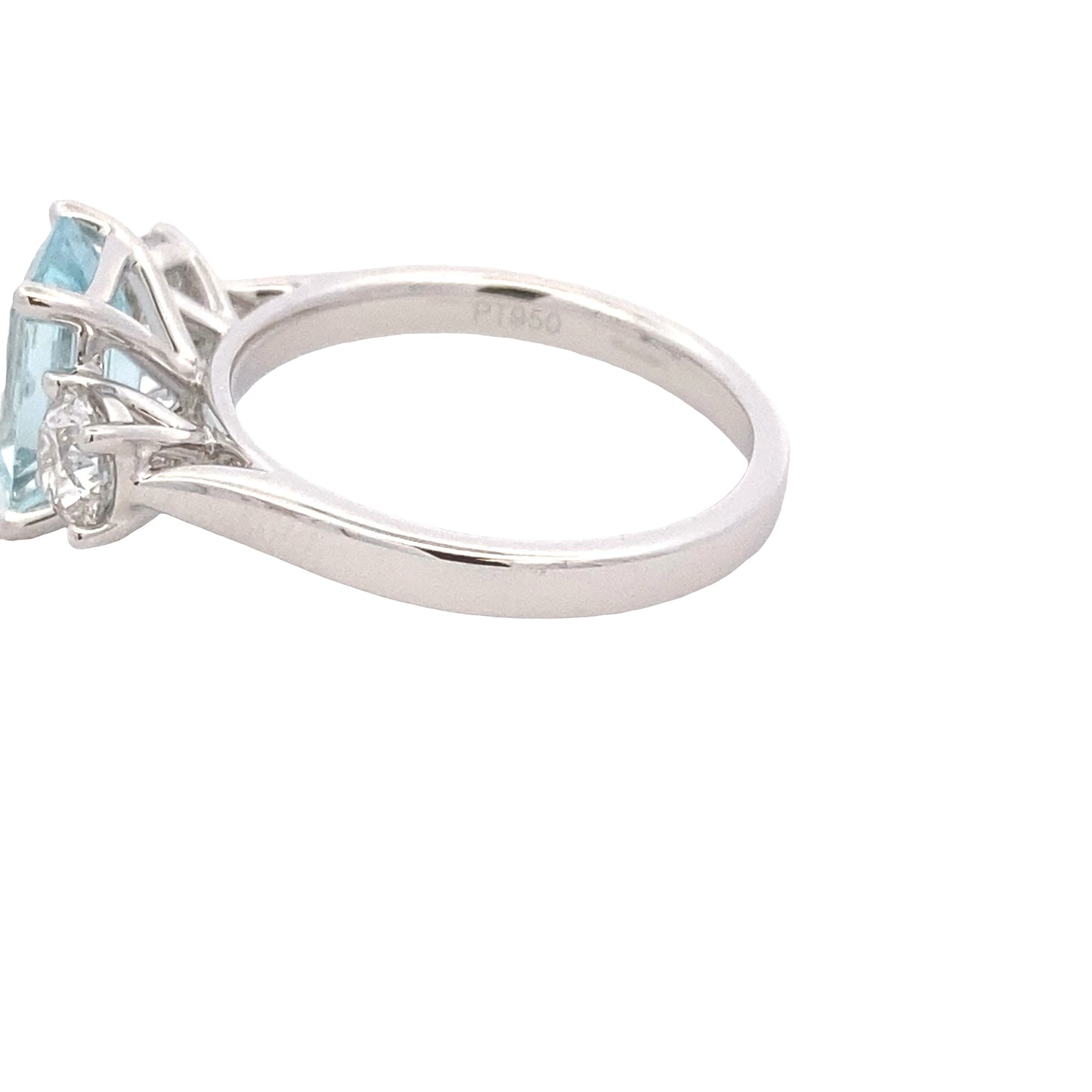 Octagonal shaped aquamarine and round brilliant cut diamond 3 stone ring Gardiner Brothers