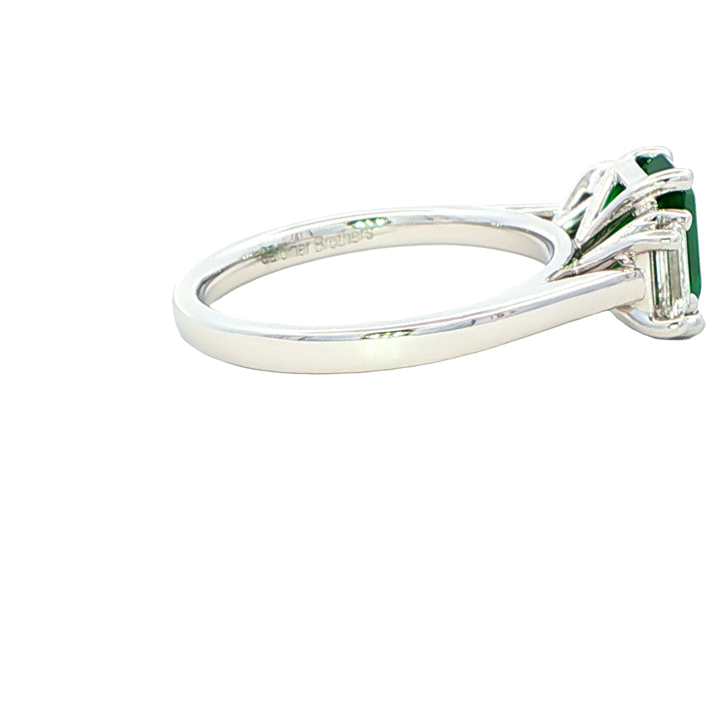 Octagonal shaped Emerald and Emerald Cut Diamond Ring Gardiner Brothers