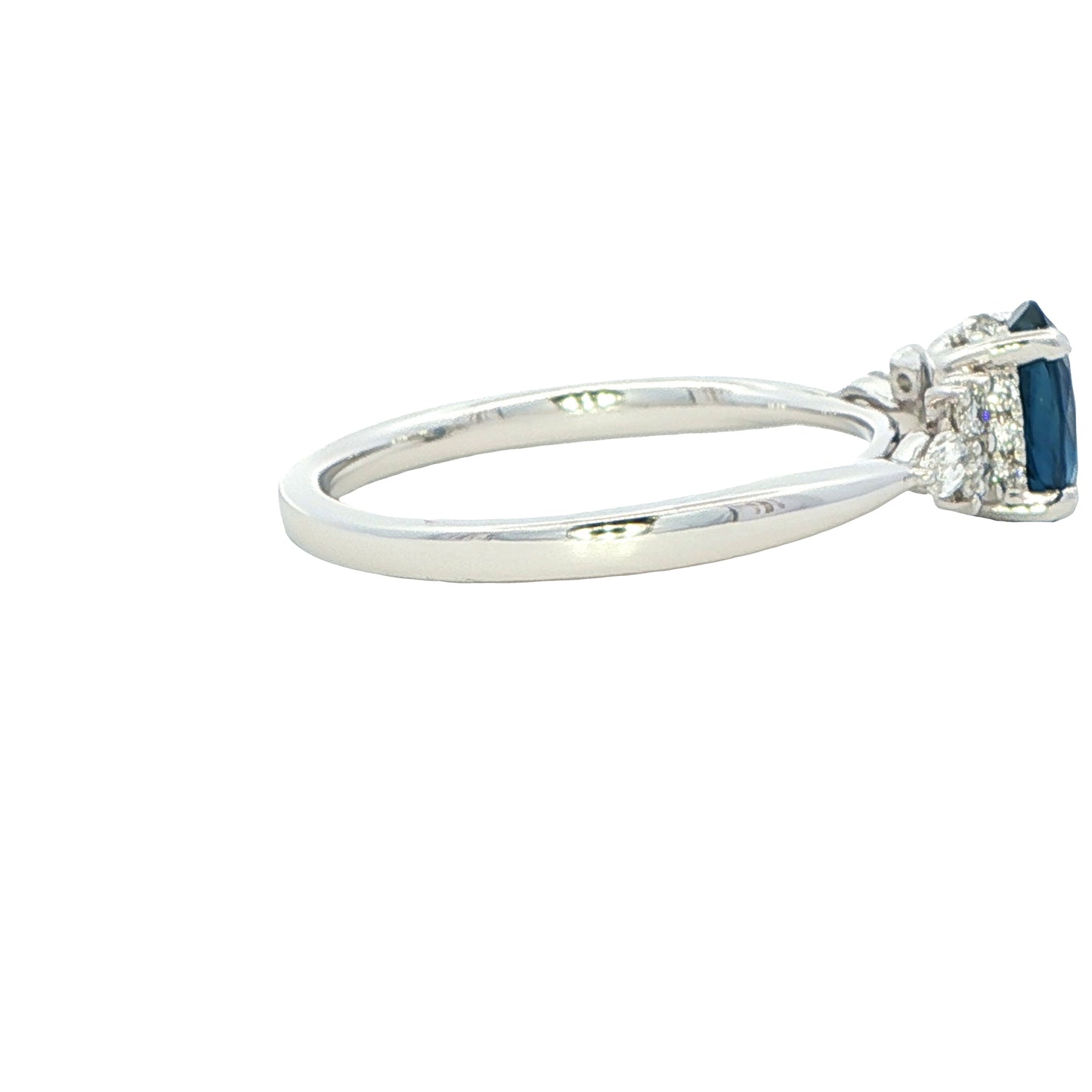 Oval shaped sapphire with brilliant and Marquise diamond set shoudlers Gardiner Brothers