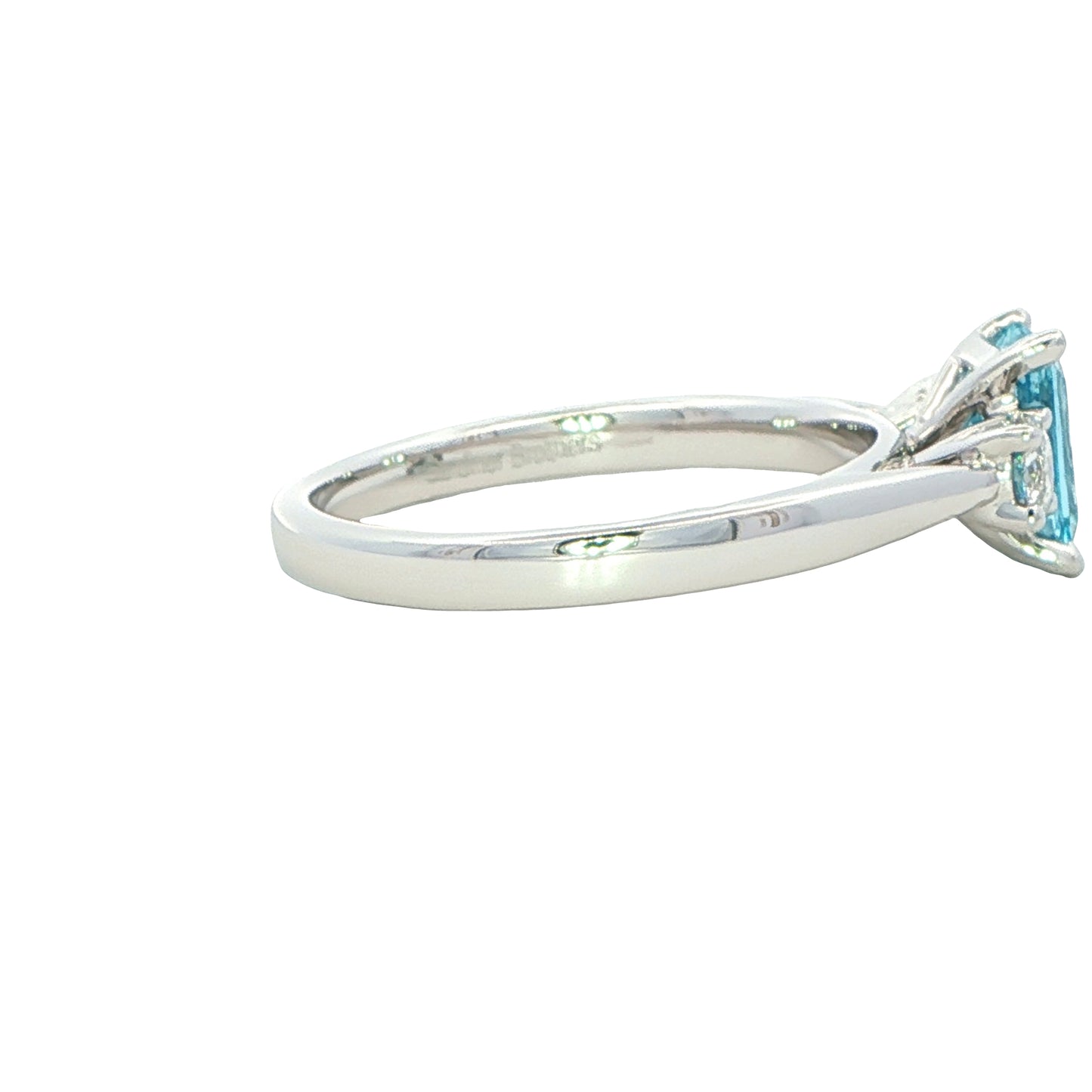 Octagonal Aquamarine and round brilliant cut diamond ring