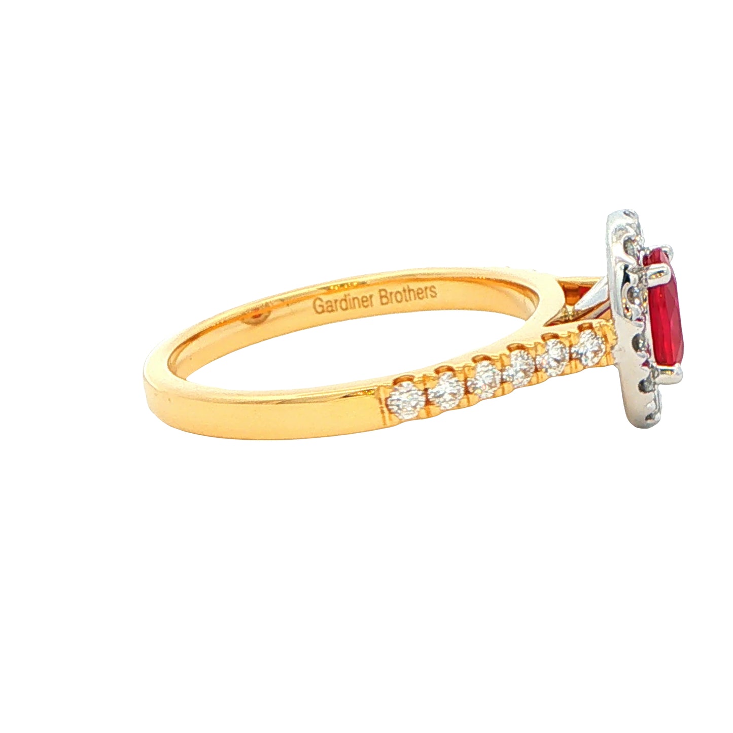 Oval Shaped Ruby and Round Brilliant Cut Diamond Halo Ring