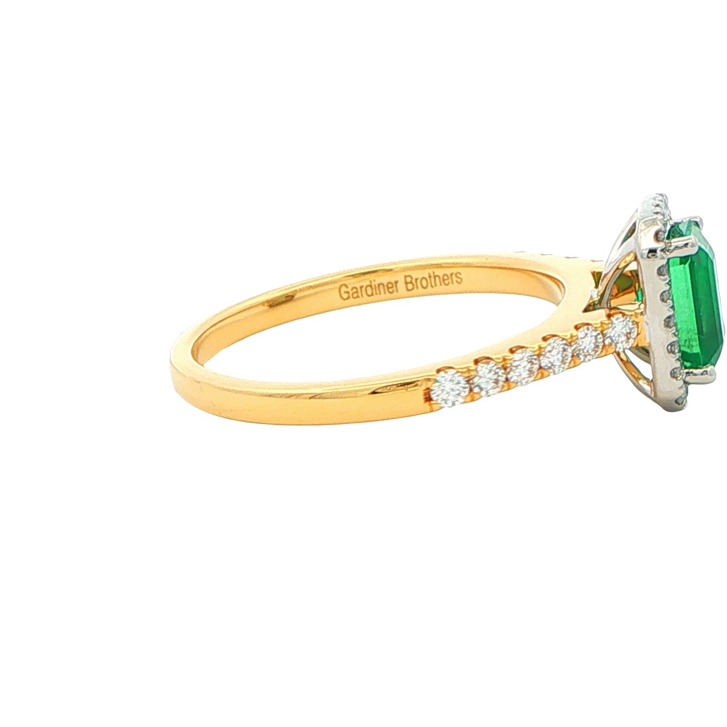 Octagonal Shaped Emerald and Diamond Halo Style Ring
