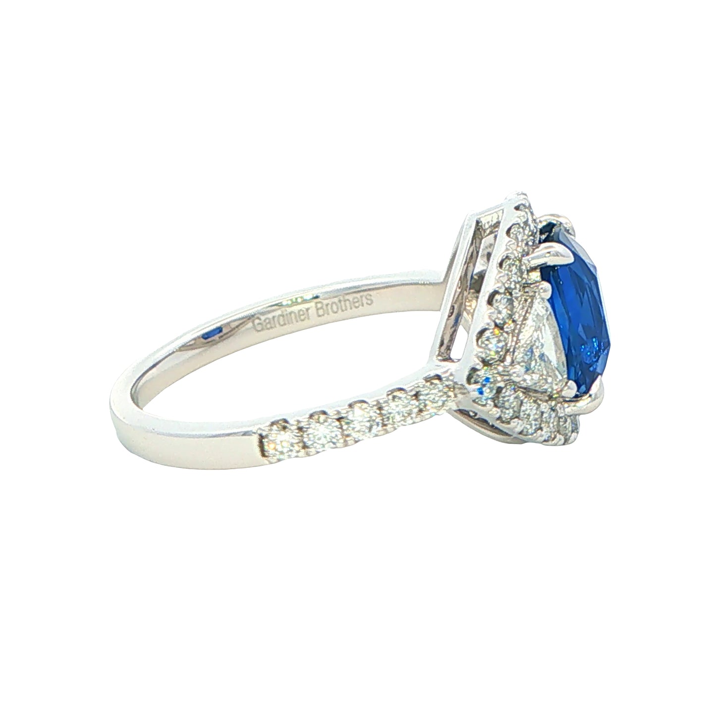 Cushion Shaped Sapphire and Trillion Cit Diamond fancy Halo Style Ring