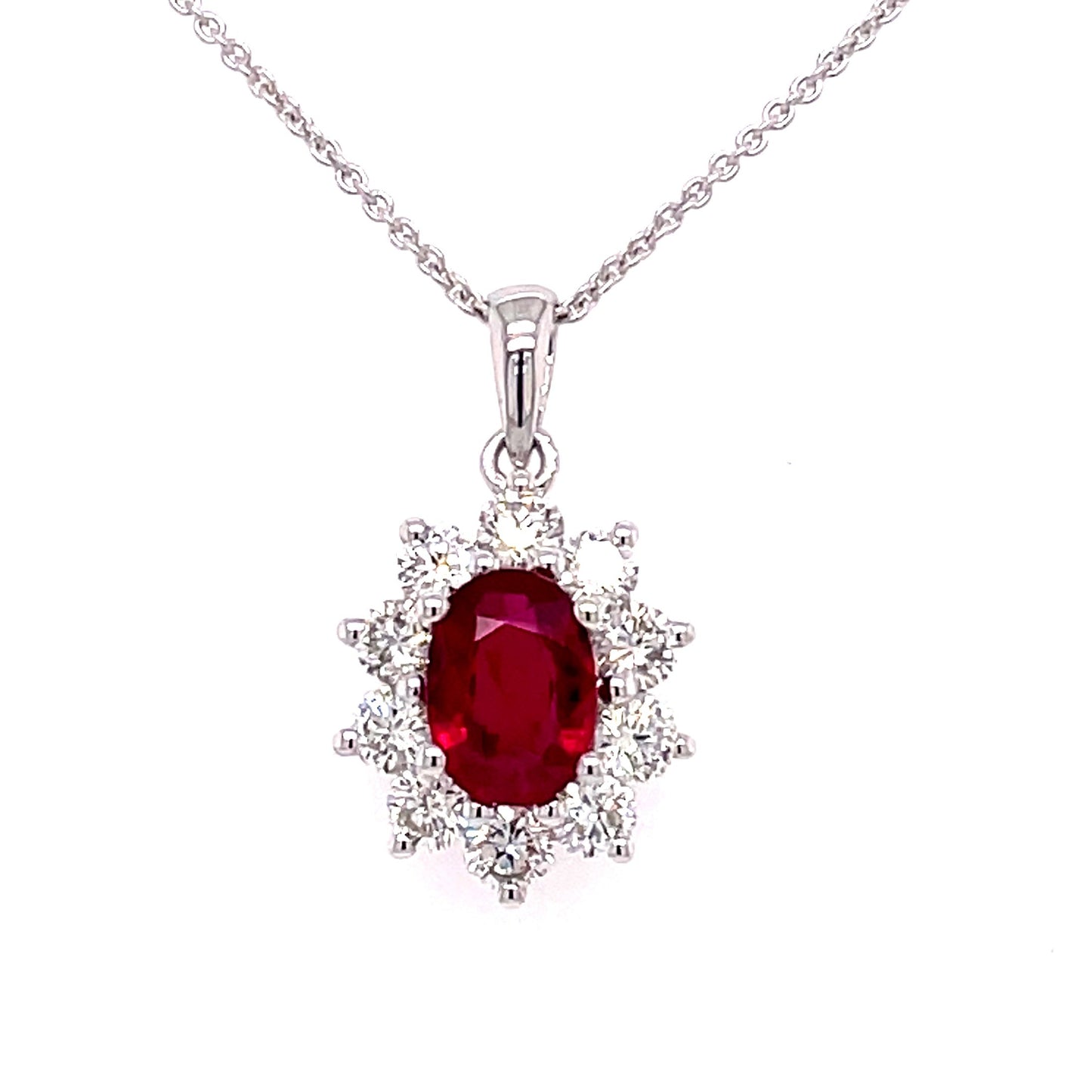 Oval Ruby and Round Brilliant Cut Diamond Cluster Style Pendant Gardiner Brothers