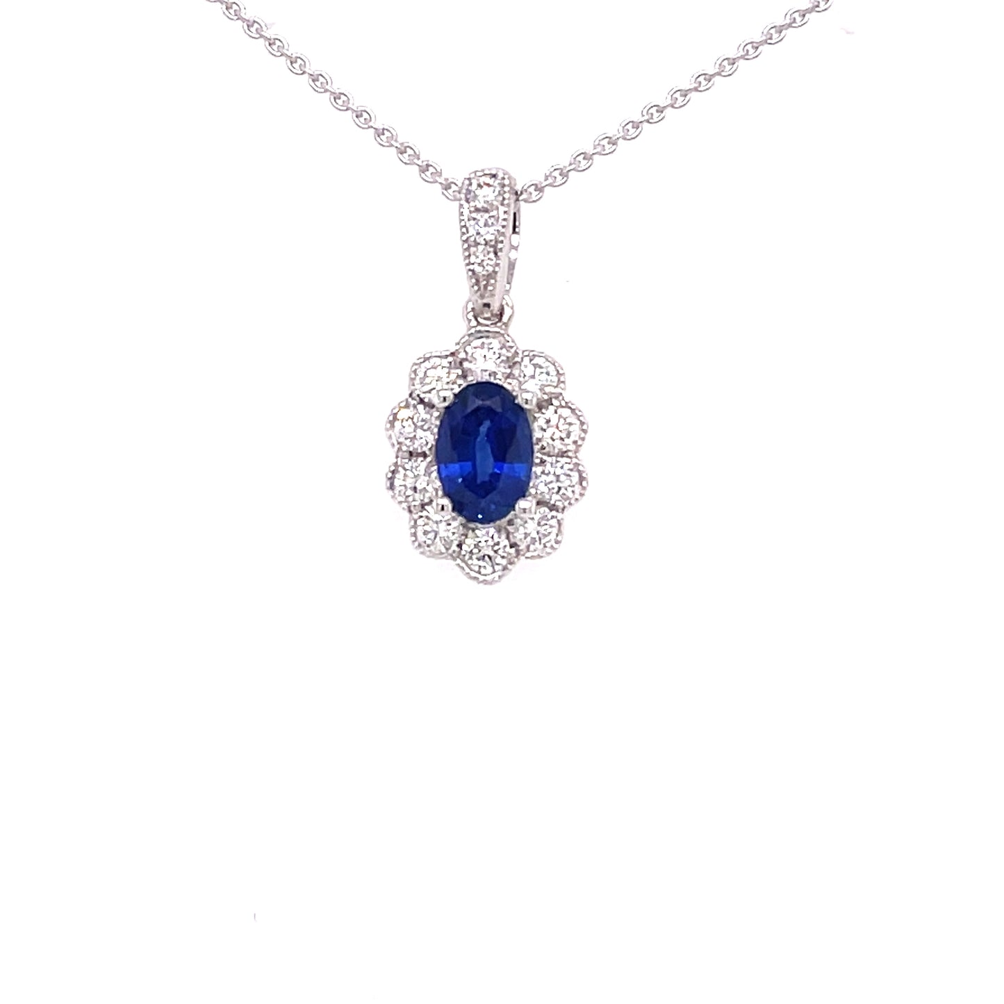 Sapphire and Round Brilliant Cut Diamond, Vintage Style Cluster Pendant Gardiner Brothers