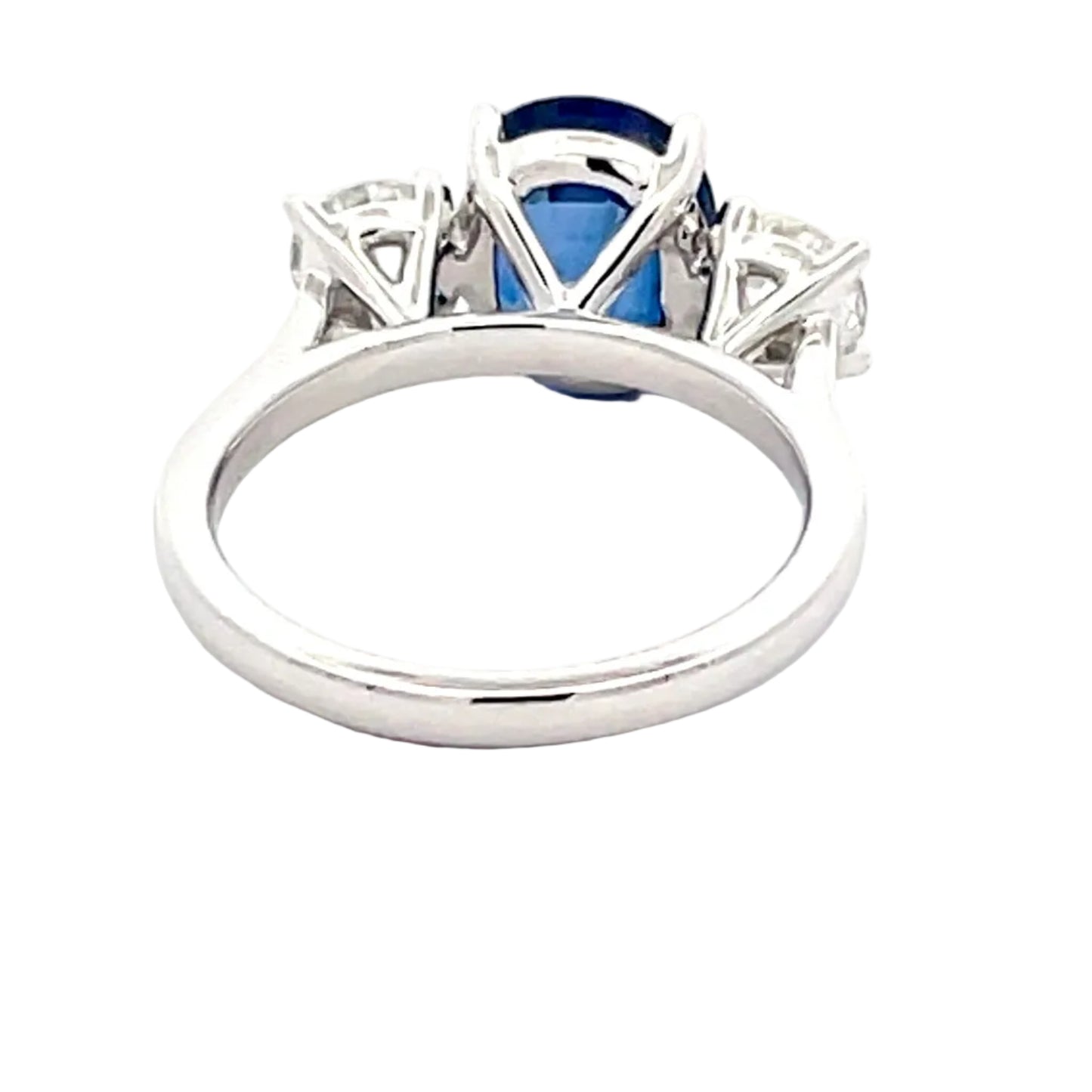 Oval Shaped Sapphire and round Brilliant cut diamond 3 stone ring Gardiner Brothers