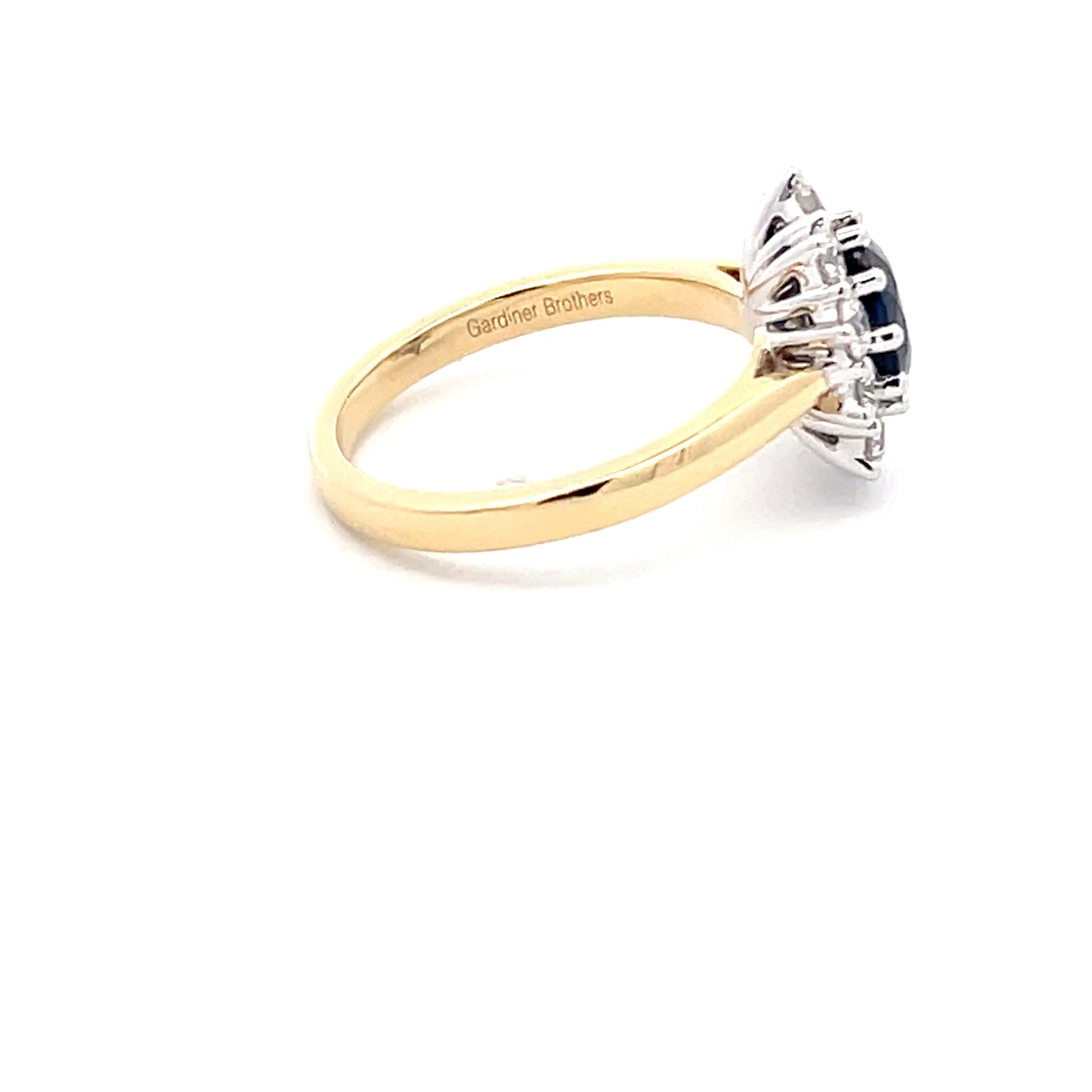 SAPPHIRE AND ROUND BRILLIANT CUT DIAMOND CLUSTER STYLE RING Gardiner Brothers