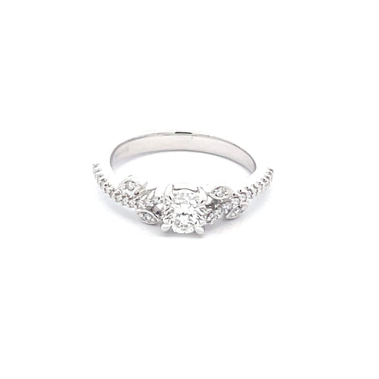 Round Brilliant Cut Diamond Solitaire with fancy diamond set shoulders - 0.65cts  Gardiner Brothers   