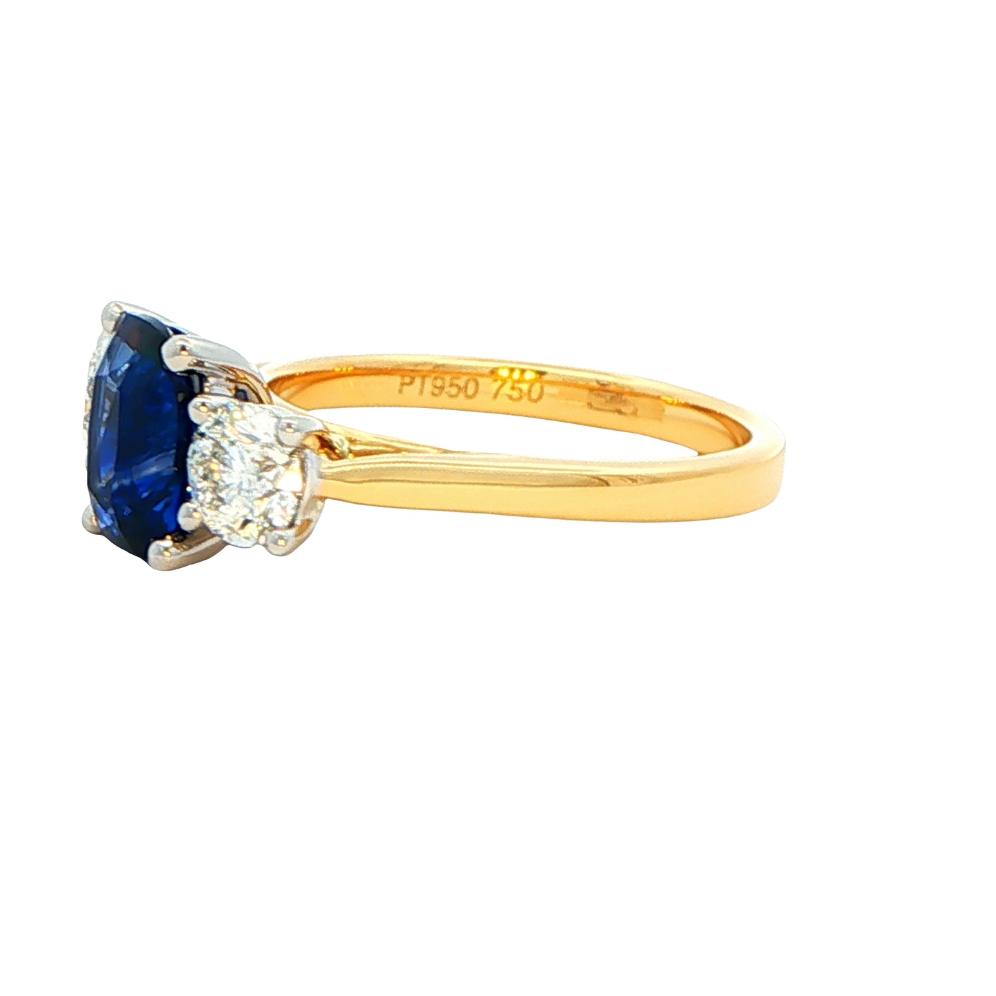 Cushion Sapphire and round brilliant cut diamond 3 stone ring Gardiner Brothers