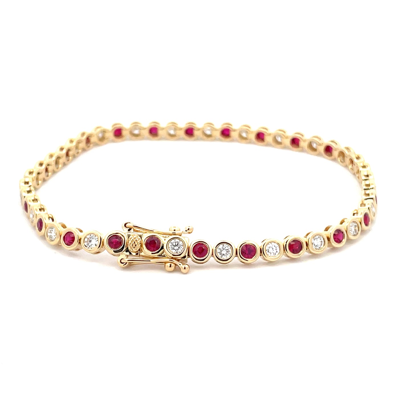 Ruby and Round Brilliant cut diamond, rub-over style tennis bracelet  Gardiner Brothers   