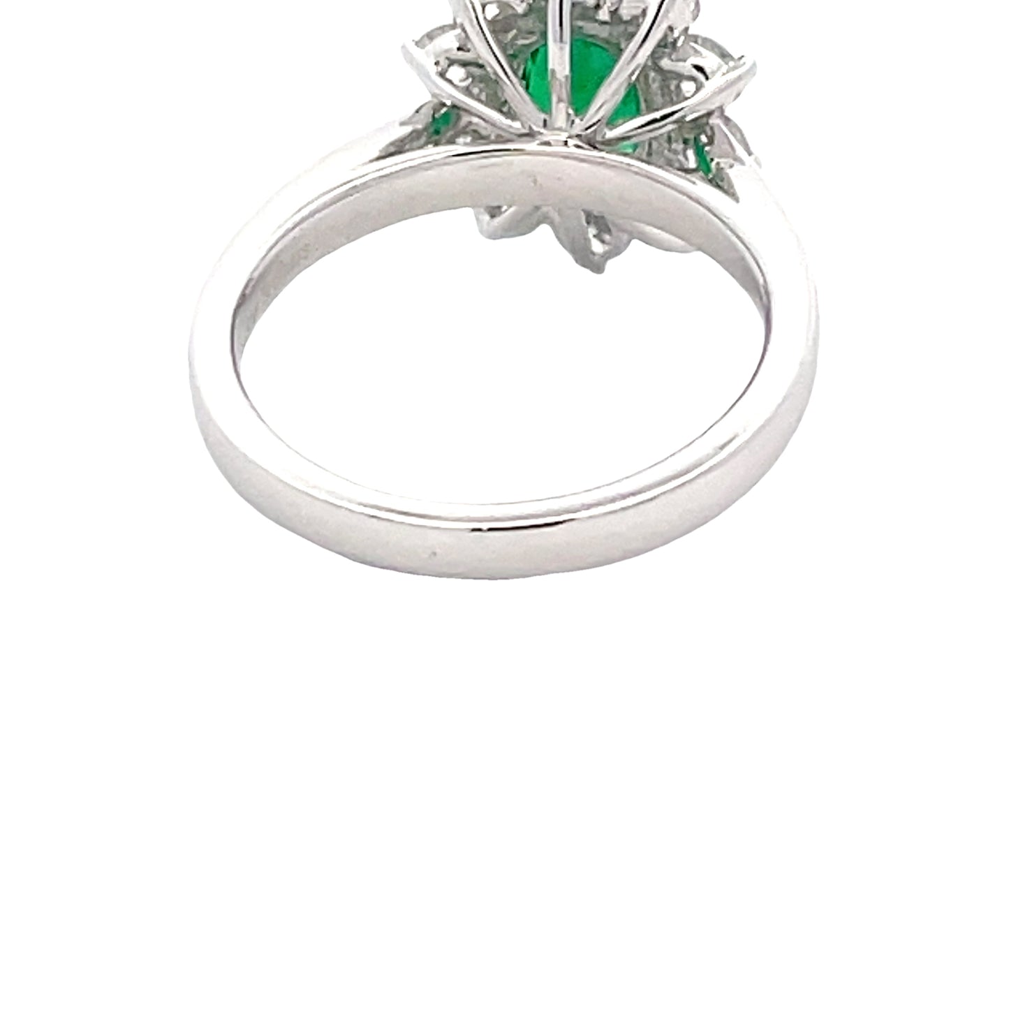 Oval Emerald and Round brilliant cut diamond cluster ring  Gardiner Brothers   