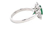 Oval Emerald and Round brilliant cut diamond cluster ring  Gardiner Brothers   