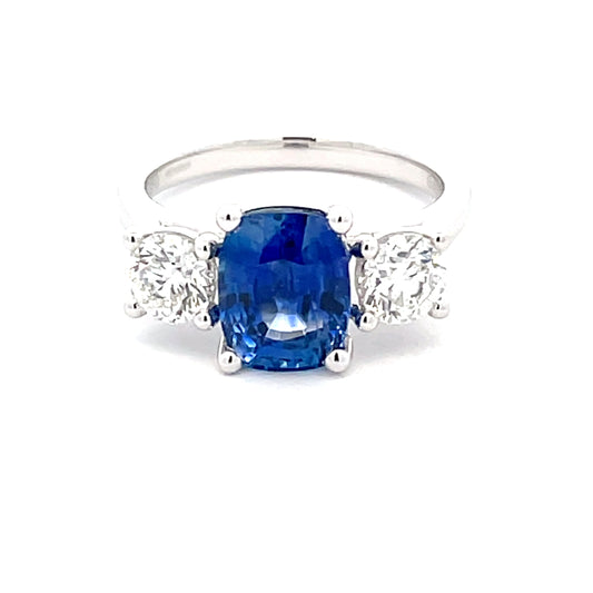 Cushion Shaped Sapphire and round brilliant cut diamond 3 stone ring  Gardiner Brothers   