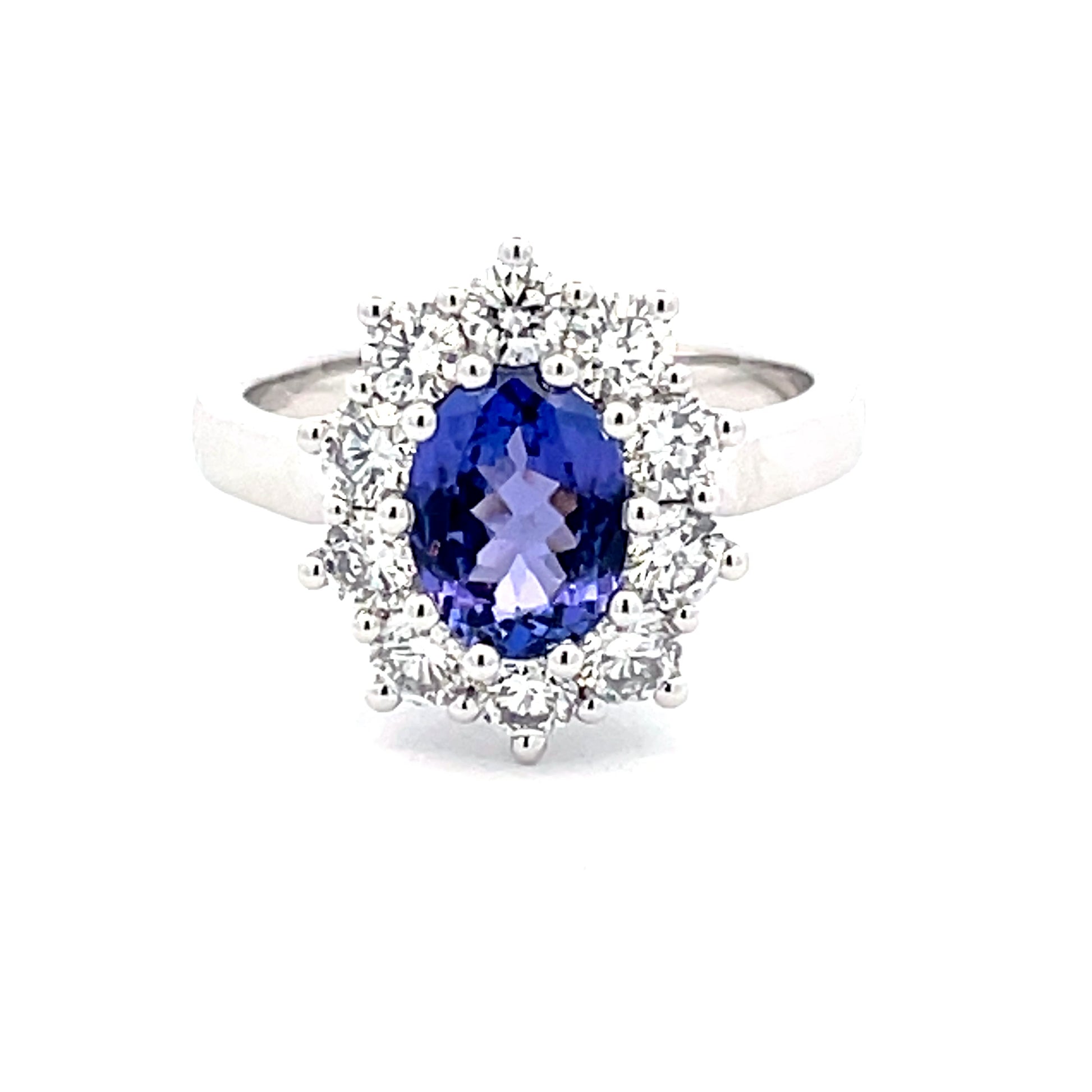 Oval Tanzanite and Round Brilliant Cut Diamond Cluster Ring  Gardiner Brothers   