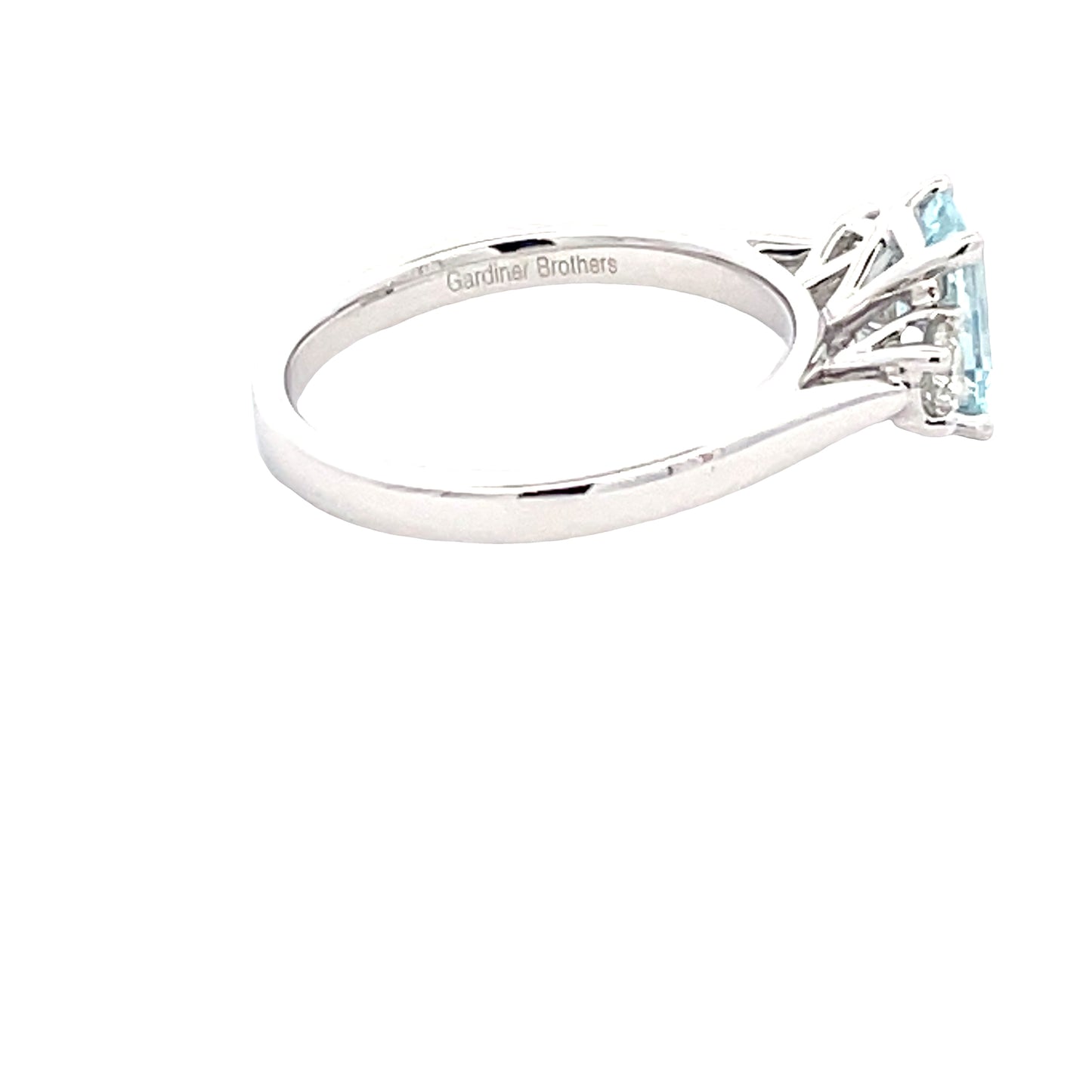 Octagonal Aquamarine and round brilliant cut diamond ring  Gardiner Brothers   