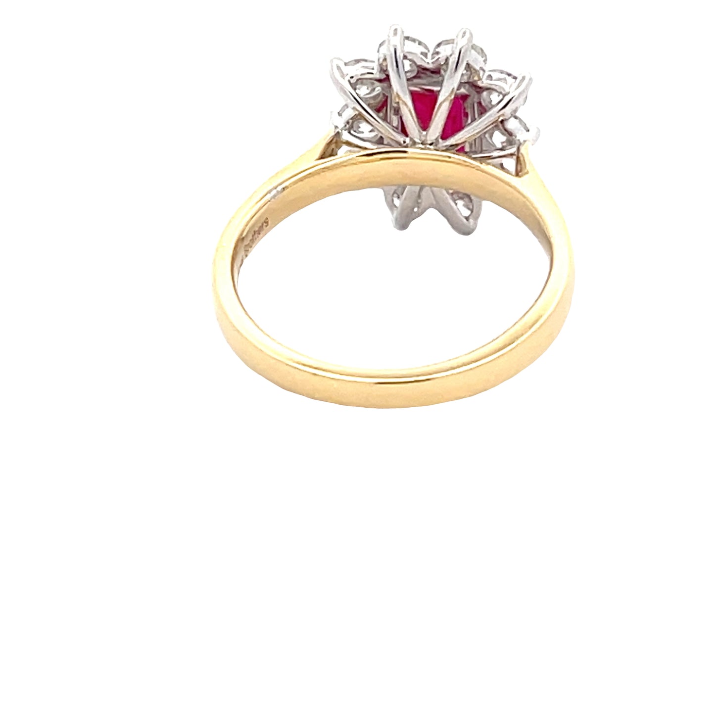 Octagonal shaped ruby and round brilliant cut diamond cluster style ring  Gardiner Brothers   