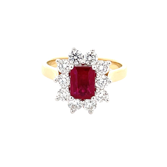 Octagonal shaped ruby and round brilliant cut diamond cluster style ring
