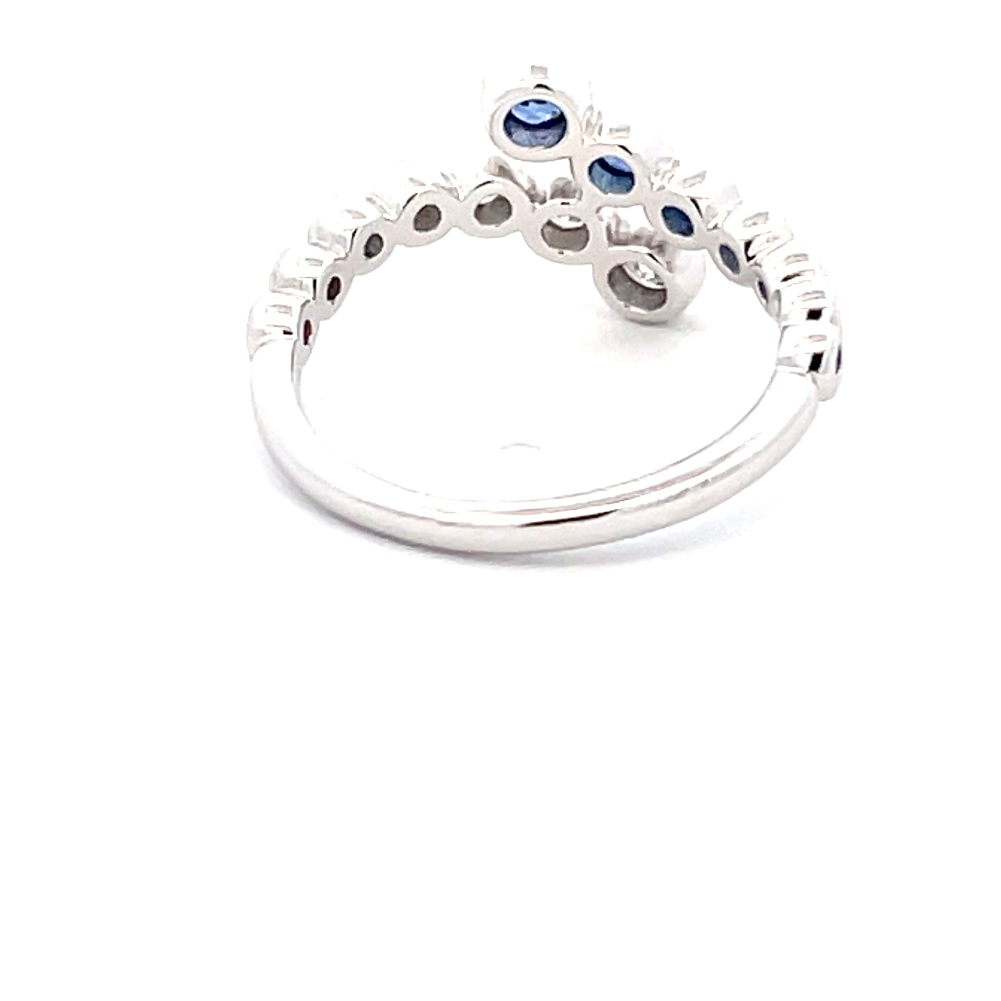 Sapphire and round brilliant cut diamond cross-over ring  Gardiner Brothers   