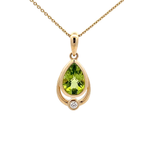 Pear Shaped Peridot and round brilliant cut diamond pendant