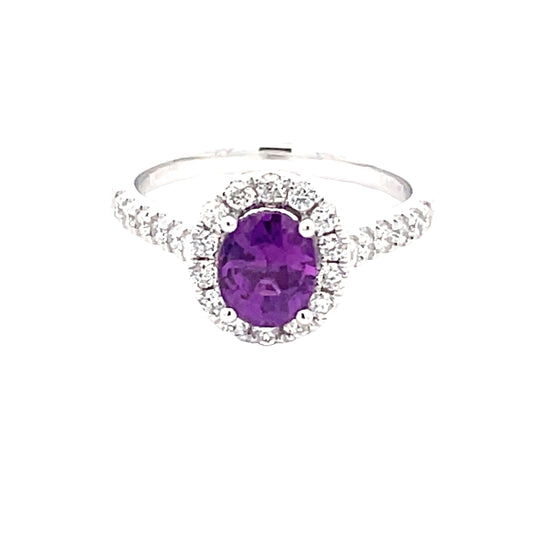 Purple Sapphire and round brilliant cut diamond halo cluster ring
