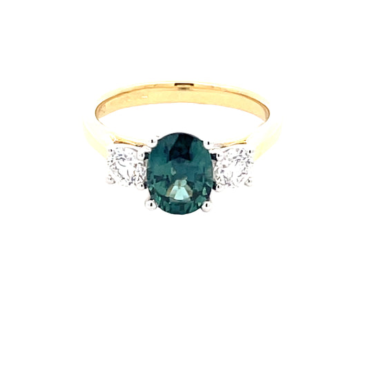 Oval Shaped Teal Sapphire and Round Brilliant Cut Diamond 3 Stone Ring