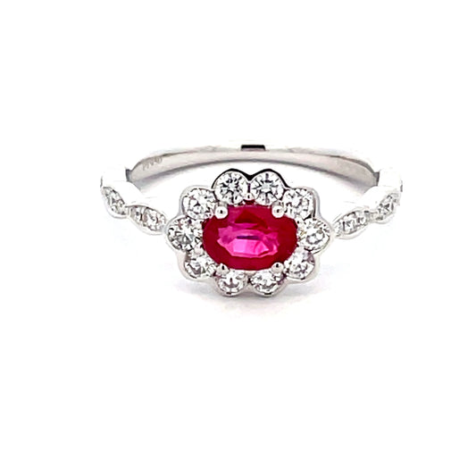 Oval Shaped Ruby and around brilliant cut diamond vintage style cluster