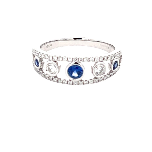 Round Sapphire and round brilliant cut diamond fancy style dress ring