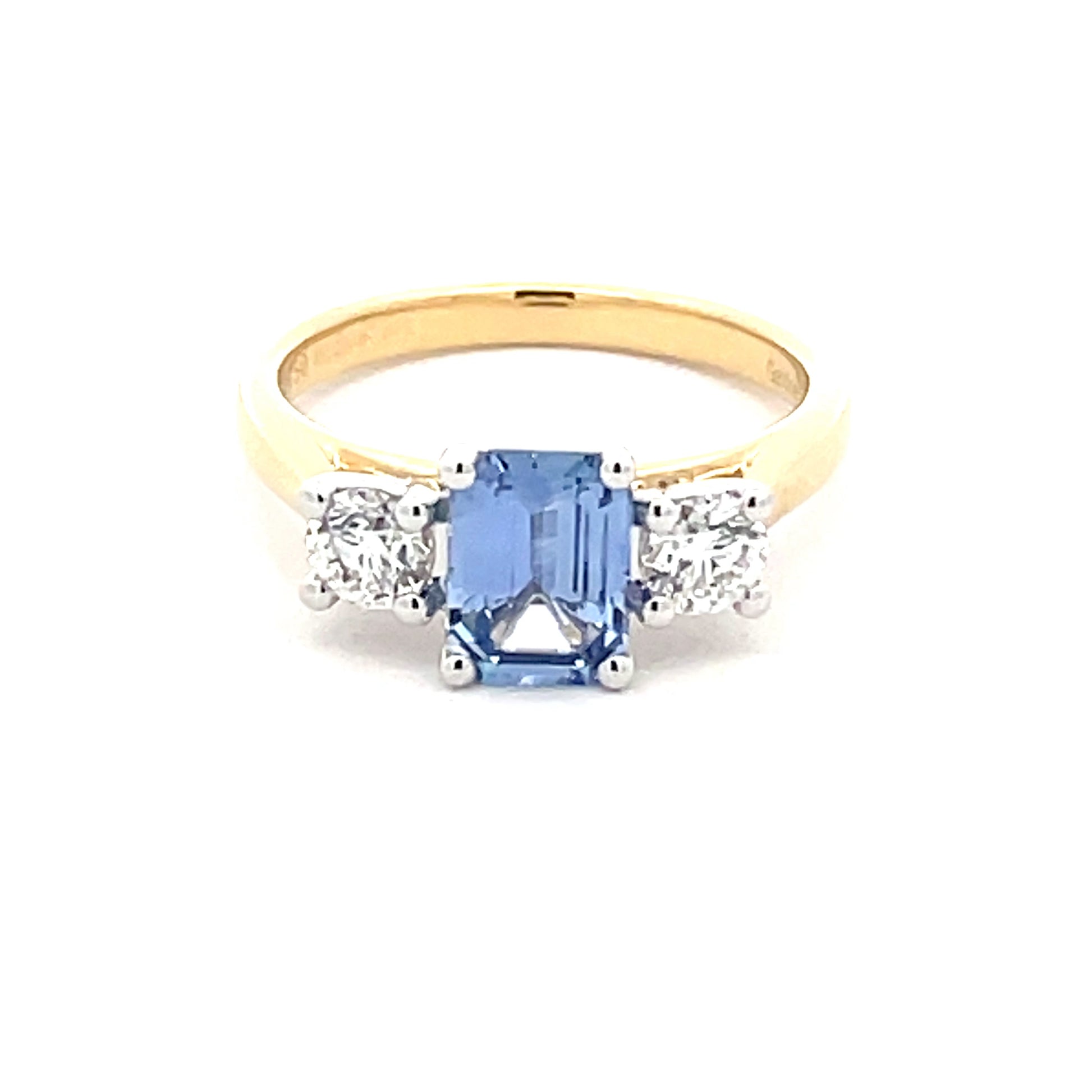 Octagonal Ceylon Sapphire and round brilliant cut diamond 3 stone ring  Gardiner Brothers   