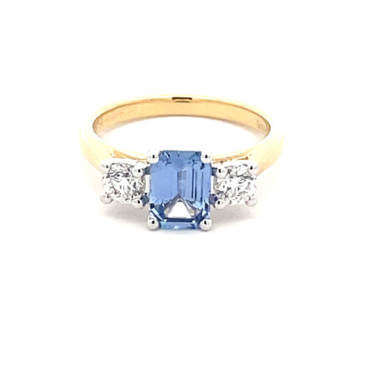 Octagonal Ceylon Sapphire and round brilliant cut diamond 3 stone ring