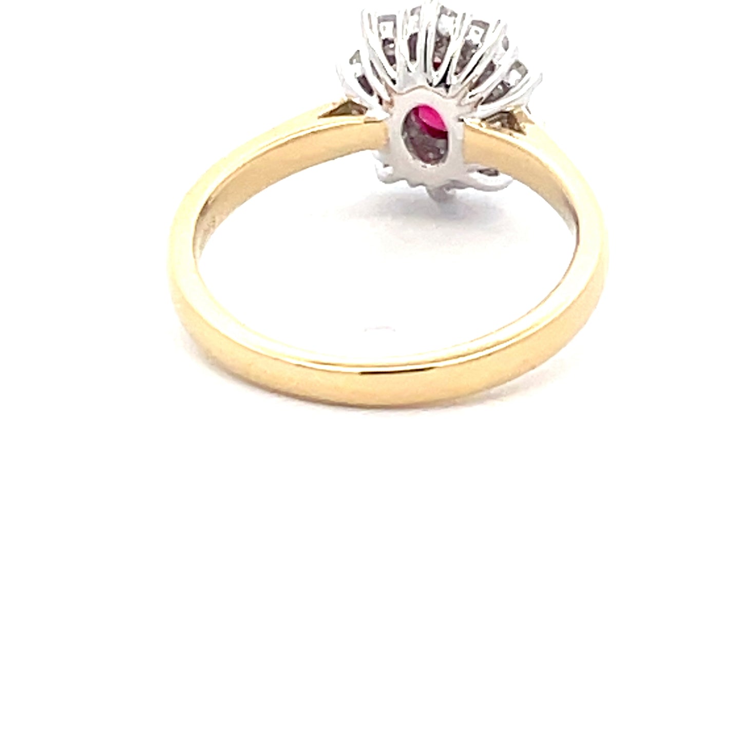 Oval Shaped Ruby and round brilliant cut diamond cluster style ring  Gardiner Brothers   