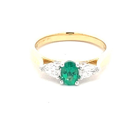 Oval Shaped Emerald and pear shaped diamond 3 stone ring