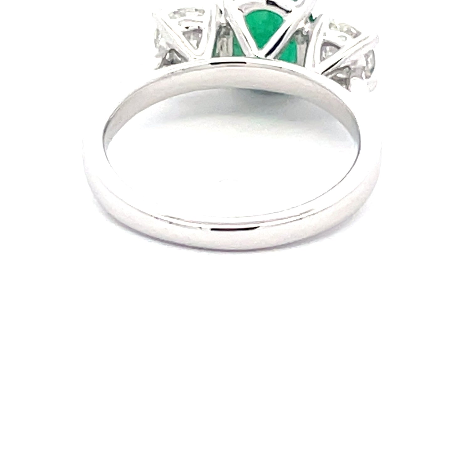 Oval Emerald and round brilliant cut diamond 3 stone ring  Gardiner Brothers   