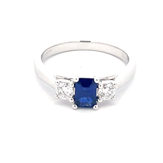 Octagonal Sapphire and round brilliant cut diamond 3 stone ring