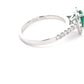 Pear Shaped emerald and round brilliant cut diamond halo cluster ring  Gardiner Brothers   