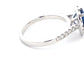 Pear Shaped Sapphire and round brilliant cut diamond halo cluster style ring  Gardiner Brothers   