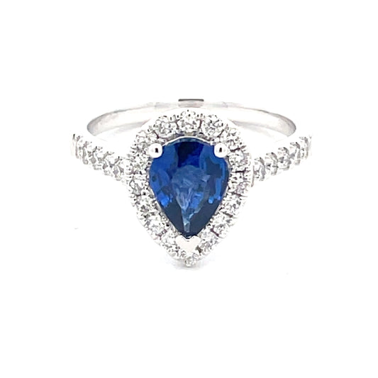 Pear Shaped Sapphire and round brilliant cut diamond halo cluster style ring