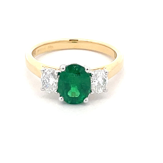 Oval Shaped Emerald and Oval Diamond 3 stone ring